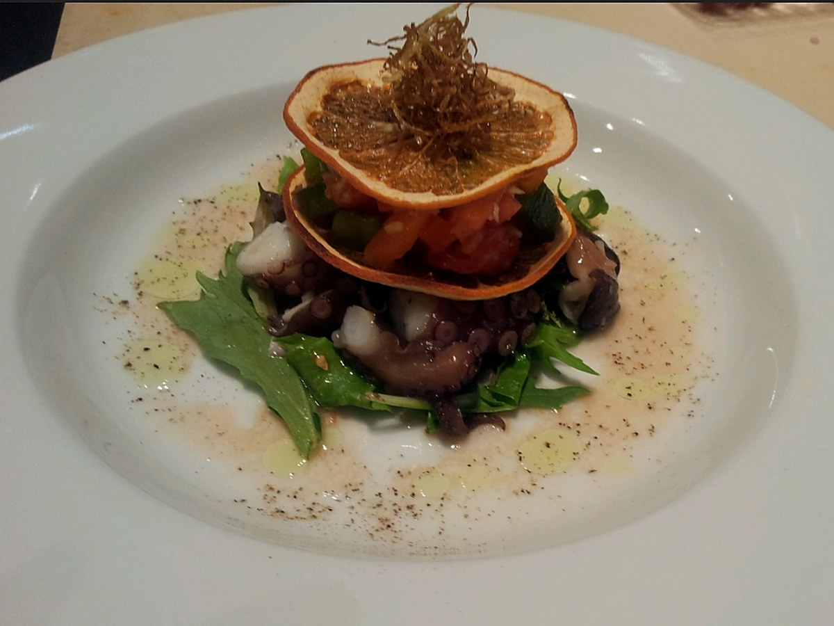Octopus salad appetizer plate