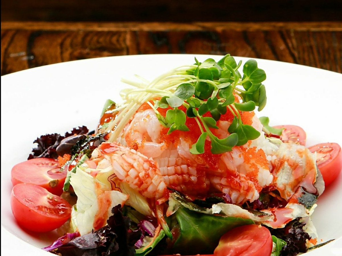 Seafood salad with cherry tomatoes