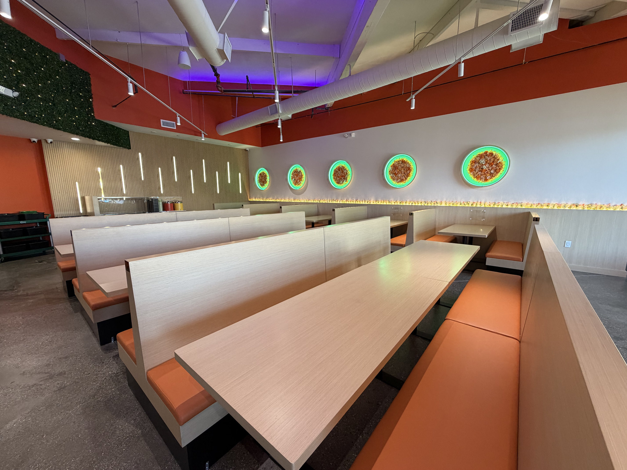 COCORI dining room with rows of booths